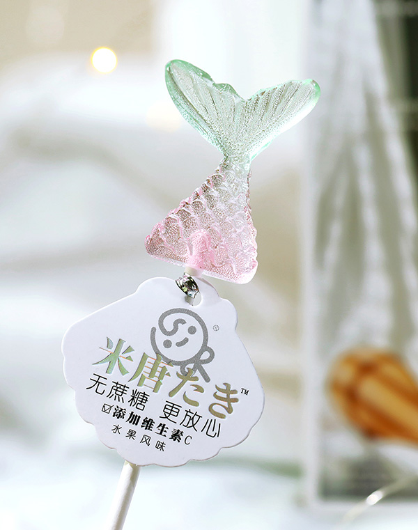 米唐たき海洋小分隊(duì)棒棒糖-魚尾漸變白桃味.jpg